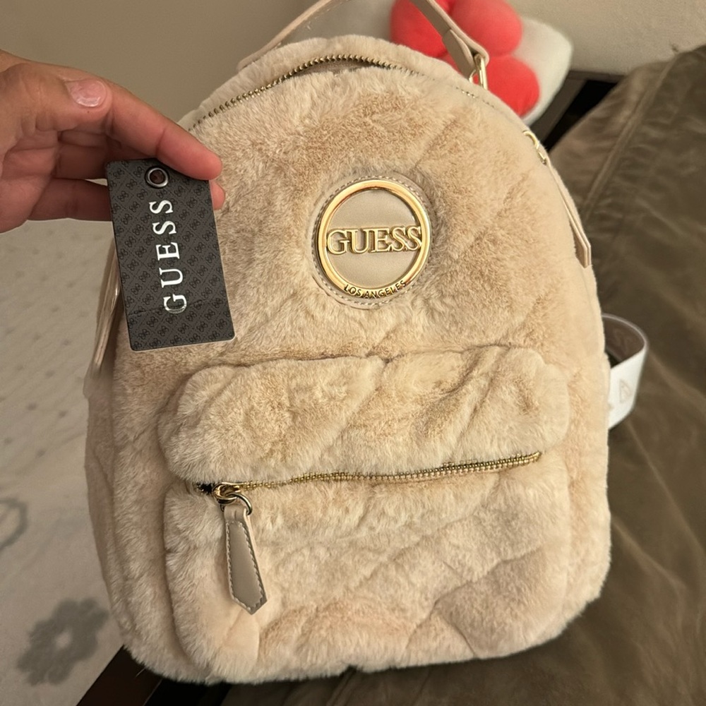 GUESS faux fur Tan mini backpack